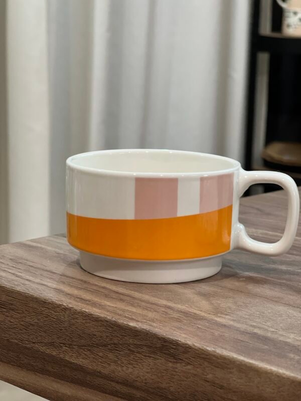 tazas de cafe moderna Artesanal naranja y rosa